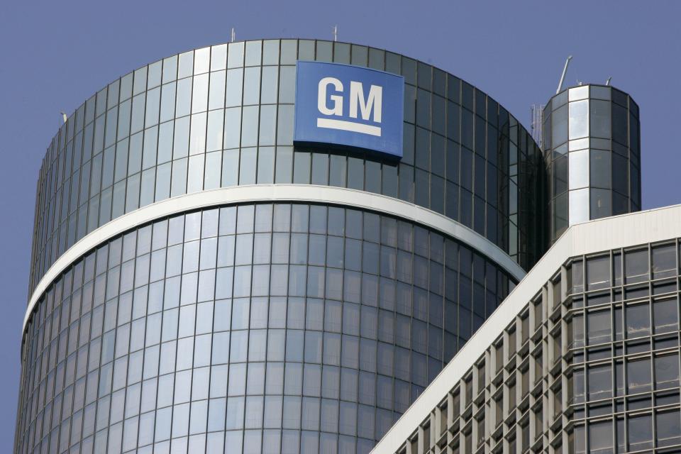 The GM logo is seen on the top of the center tower at the GM Renaissance Center in Detroit.
