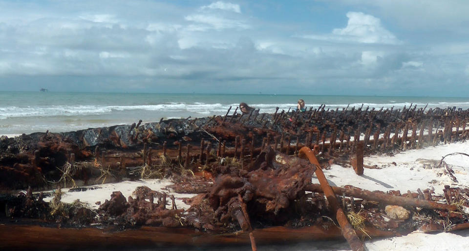 The wreckage of the schooner Rachel sits on Fort Morgan beach in Gulf Shores, Ala., on Thursday, Sept. 6, 2012. The Rachel ran aground during a storm on Oct. 17, 1923. She has been uncovered and re-covered by storms and hurricanes many times since. The wreckage was uncovered again during Hurricane Isaac. (AP Photo/Melissa Nelson Gabriel)