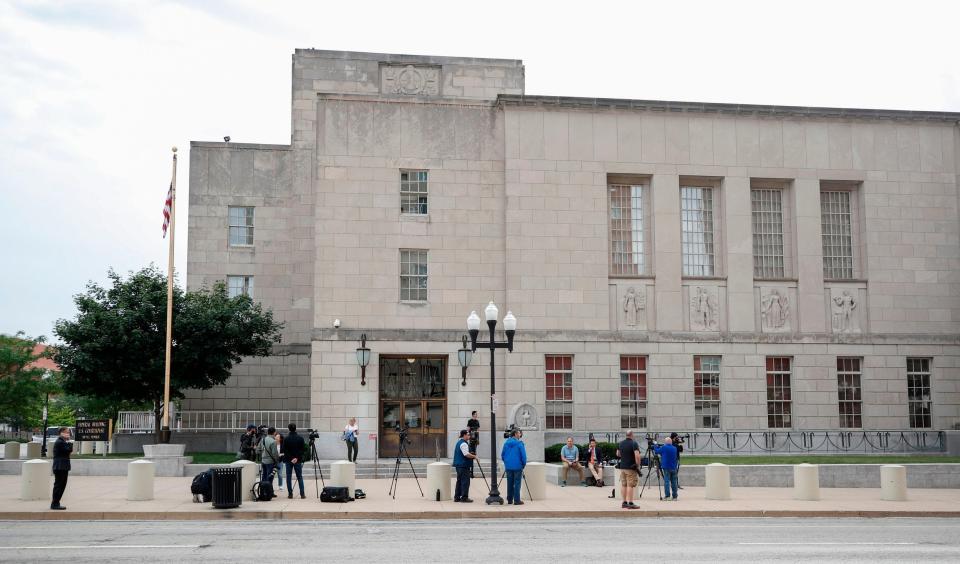 Members of the media wait outside the US Courthouse as federal trial of Brendt Christensen. (AFP/Getty Images)