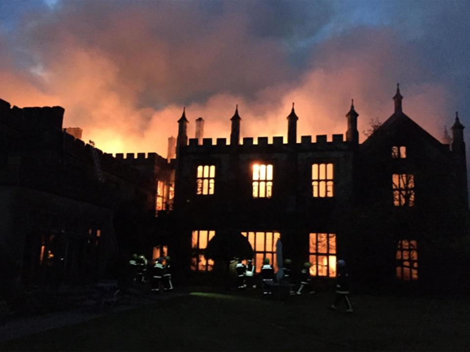 Parnham House, built in 1522, was consumed by flames in the early hours of Saturday morning: Craig Baker/ Dorset&Wiltshire Fire