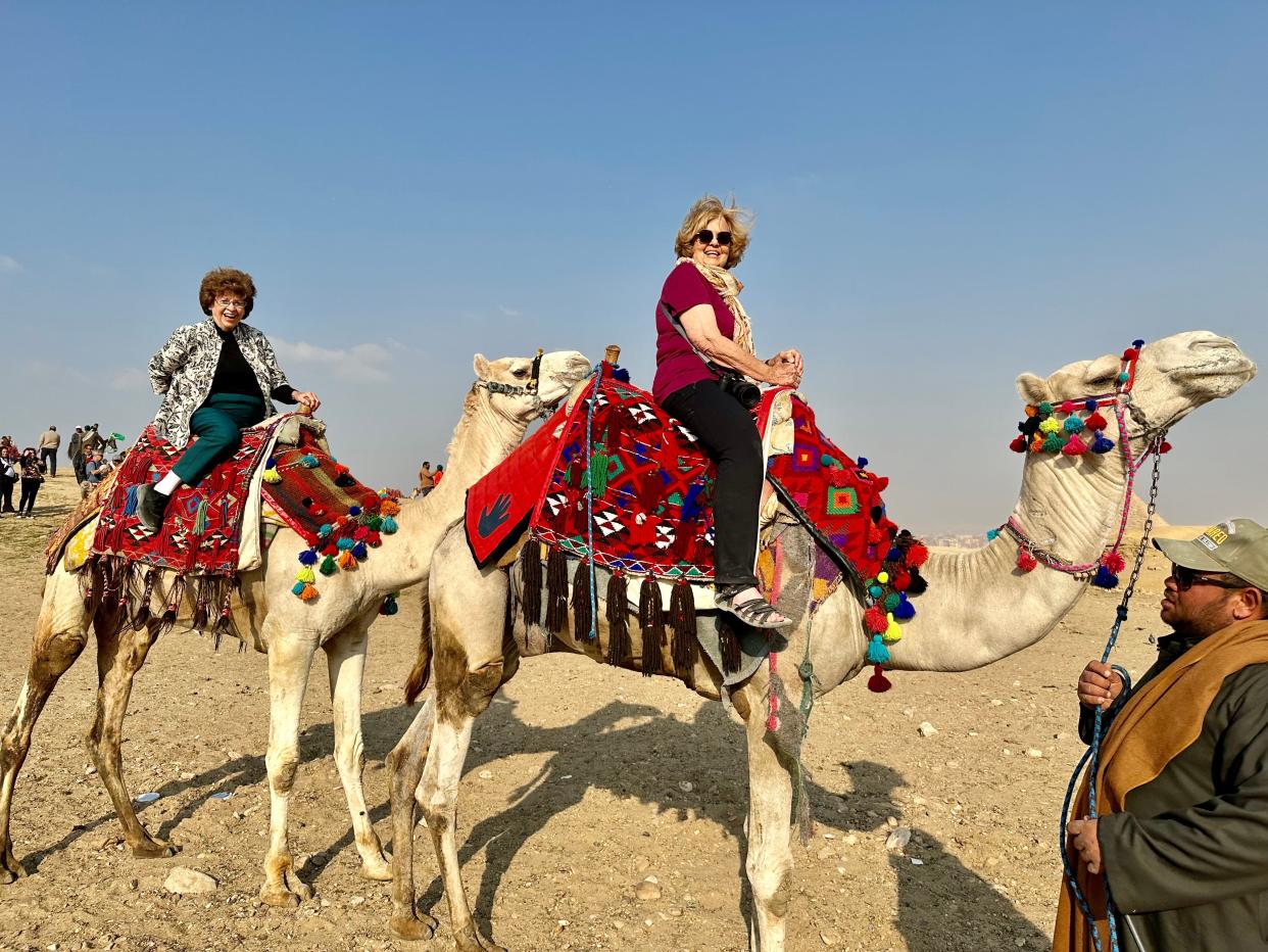 Best friends Sandy Hazelip and Ellie Hamby ride camels in Egypt in February.