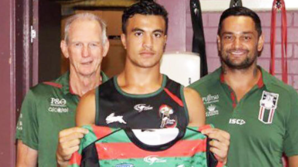 Joseph Suaalii, pictured here with Wayne Bennett and John Sutton at South Sydney.