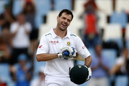 South Africa's Stephen Cook celebrates his century during the fourth cricket test match against England in Centurion, South Africa, January 22, 2016. REUTERS/Siphiwe Sibeko