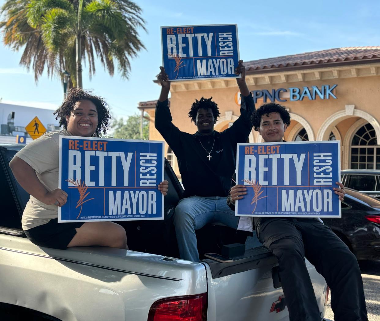 Supporters for Betty Resch rally voters outside the Lake Worth Beach Library before Tuesday night's runoff election. Resch defeated Andy Amoroso to win a third term for mayor.