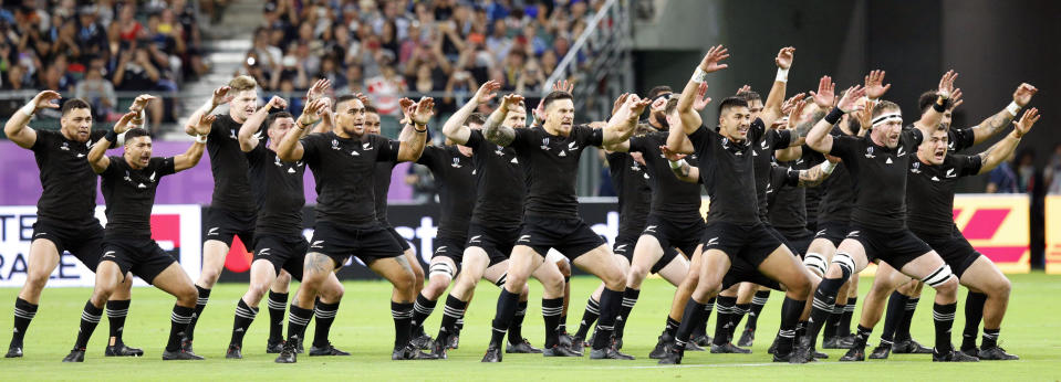 New Zealand's players perform the haka ahead of the Rugby World Cup Pool B game at Oita Stadium between New Zealand and Canada in Oita, Japan, Wednesday, Oct. 2, 2019. (Miyuki Saito/Kyodo News via AP)