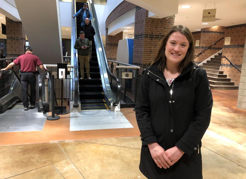 Brooke Thiel, an agriculture professor at North Dakota State University, poses after voting at the Fargodome in Fargo, N.D., on Tuesday, Nov. 8, 2022. (AP Photo/Dave Kolpack)