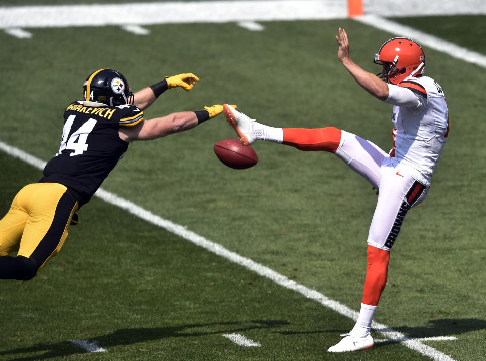 Cleveland Browns punter Britton Colquitt (4) didn't kick this punt out of the stadium in Week 1, because it was blocked. (AP)