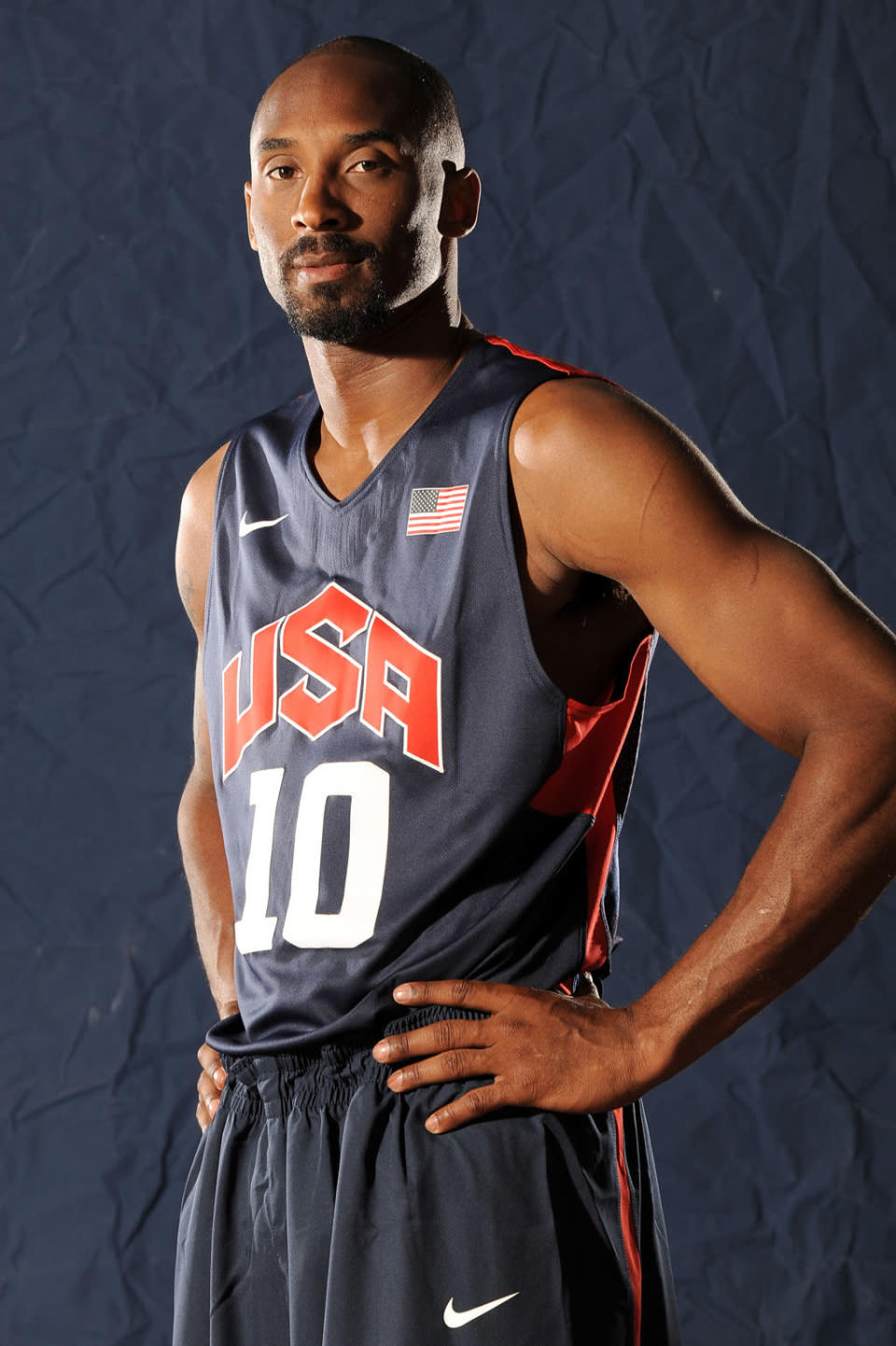 <b>Kobe Bryant</b><br> Kobe’s looks make him a winner on and off the court. No doubt we'll see Team USA's biggest star flashing his confident grin atop the podium in London. (Photo by Andrew D. Bernstein/NBAE via Getty Images)