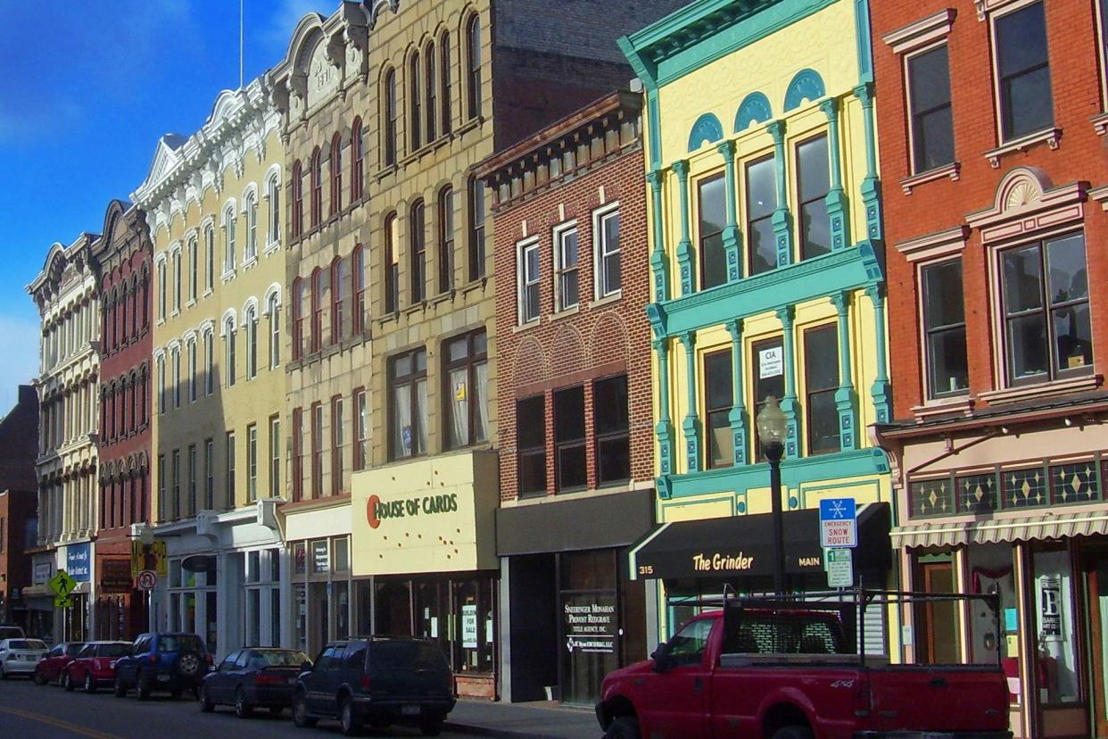 Colorful buildings on Main Mall Row in Poughkeepsie, NY on a sunny morning.