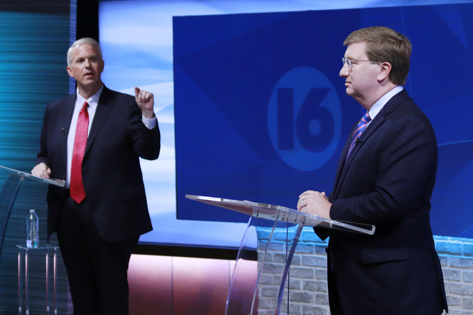 Brandon Presley, the Democratic nominee for governor, left, debates with Republican Mississippi Gov. Tate Reeves during a televised gubernatorial debate Wednesday, Nov. 1, 2023, in Jackson, Miss. (Brett Kenyon/WAPT via the AP)