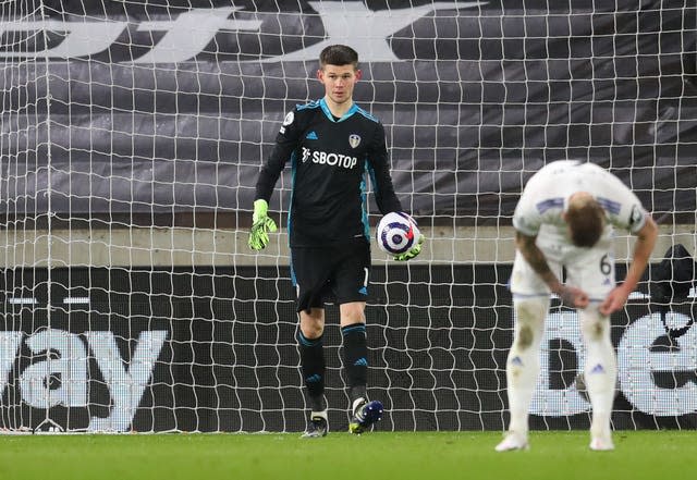 Illan Meslier picks the ball out of the net 