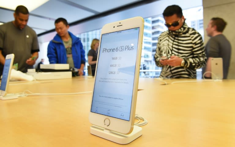 The new Apple iPhone 6s Plus is displayed as it goes on sale in Sydney on September 25, 2015. Apple launched the new iPhone 6s and iPhone 6s Plus on September 25 featuring 3D touch screen technology. AFP PHOTO / William WEST