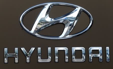 FILE PHOTO - The logo of South Korean car manufacturer Hyundai is seen at a car dealer in Dietlikon, Switzerland October 11, 2016. REUTERS/Arnd Wiegmann/File Photo