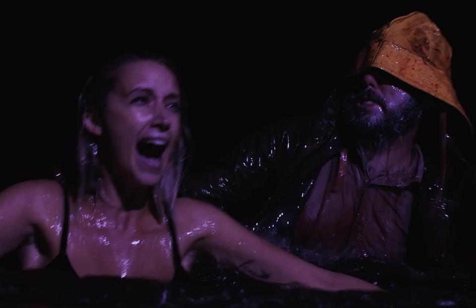 The villainous fisherman Fish Man Sam (Jim Cannatelli of New Castle) terrorizes a poor woman (Heather Street of Newark) in the campy Delaware horror film 'Slaughter Beach,' which is available on Tubi and Amazon Prime.