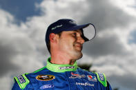 DAYTONA BEACH, FL - FEBRUARY 19: Casey Mears, driver of the #13 GEICO Ford, looks on after qualifying for the NASCAR Sprint Cup Series Daytona 500 at Daytona International Speedway on February 19, 2012 in Daytona Beach, Florida. (Photo by Tom Pennington/Getty Images for NASCAR)