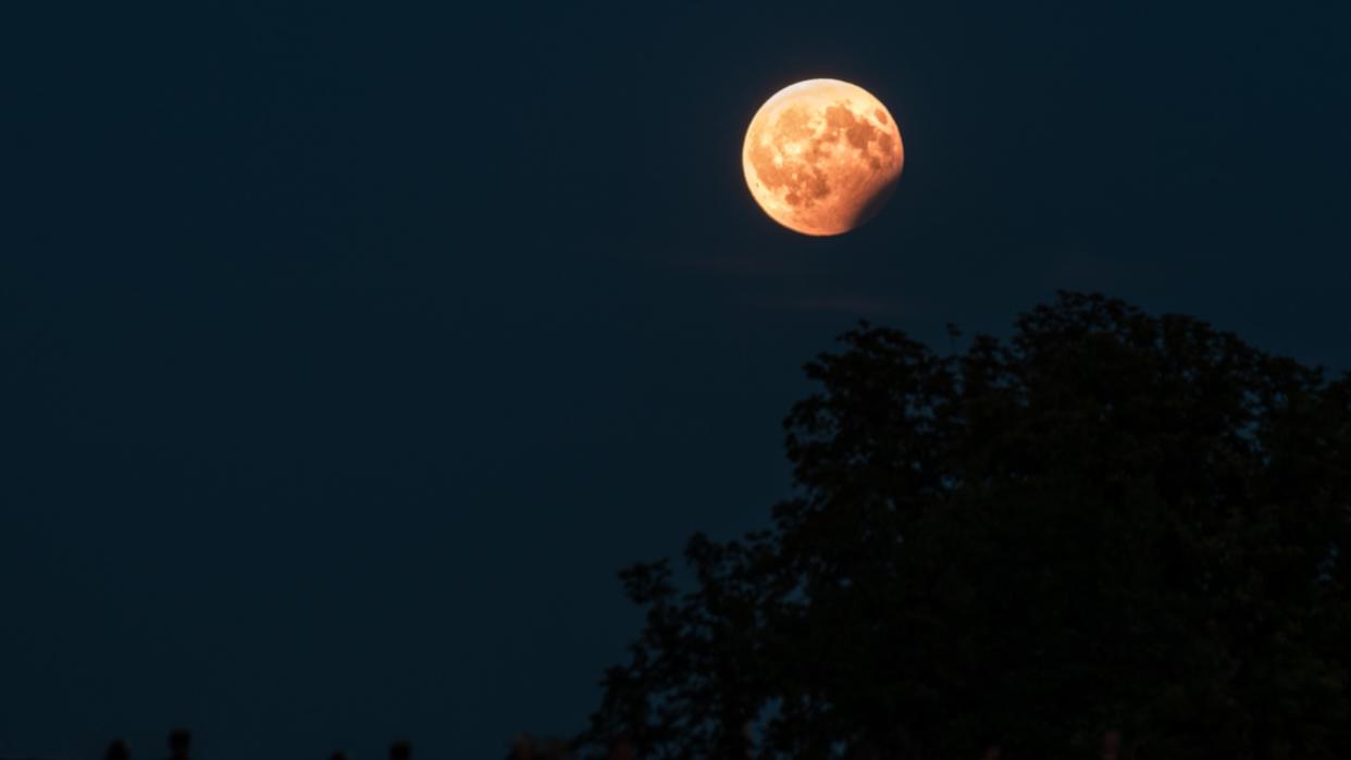  Moon partially obscured by Earth's shadow. 