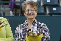 FILE - In this April 7, 2012, file photo, Nancy Richey, a member of the original nine women who helped start the women's professional tennis tour, is honored at the Family Circle Cup tennis tournament in Charleston, S.C. It’s the 50th anniversary of Billie Jean King and eight other women breaking away from the tennis establishment in 1970 and signing a $1 contract to form the Virginia Slims circuit. That led to the WTA Tour, which offers millions in prize money. (AP Photo/Mic Smith, File)