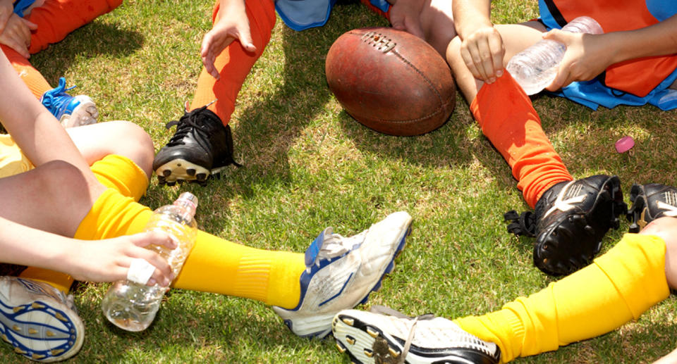 File photo of AFL players' feet as parents banned from yelling during Melbourne junior matches. 