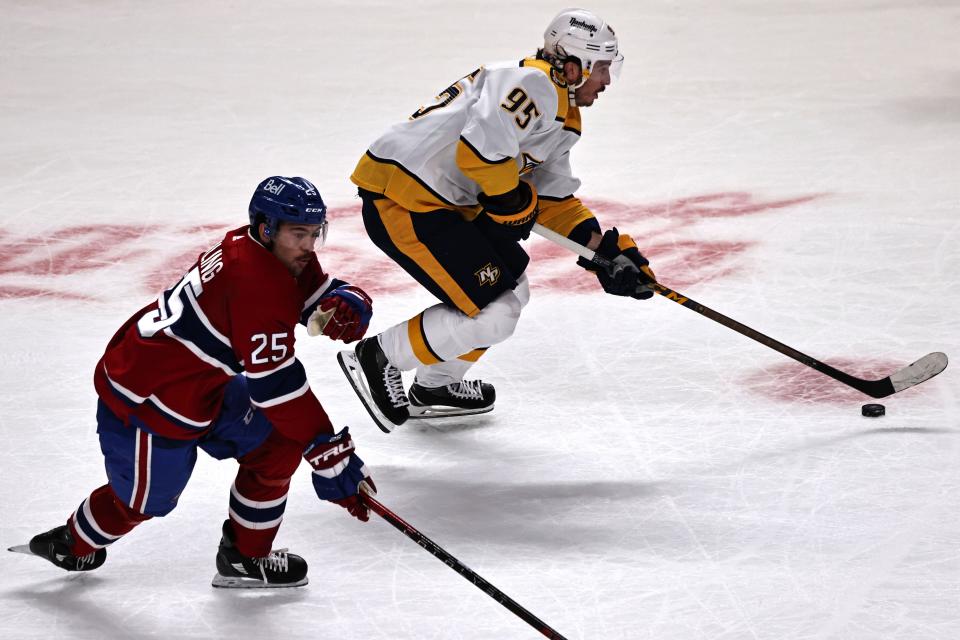 Nov 20, 2021; Montreal, Quebec, CAN; Nashville Predators center Matt Duchene (95) skates with the puck against Montreal Canadiens center Ryan Poehling (25) during the first period at Bell Centre.