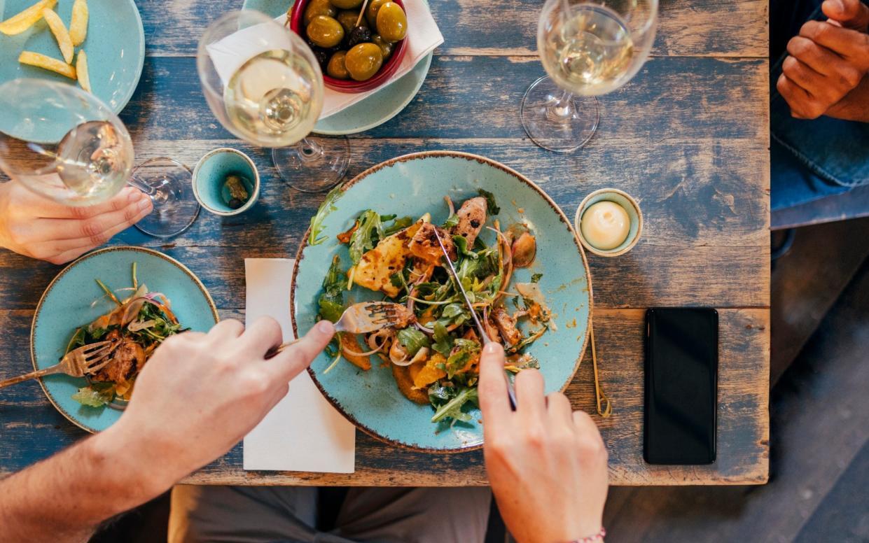 Eating salad in a cafe