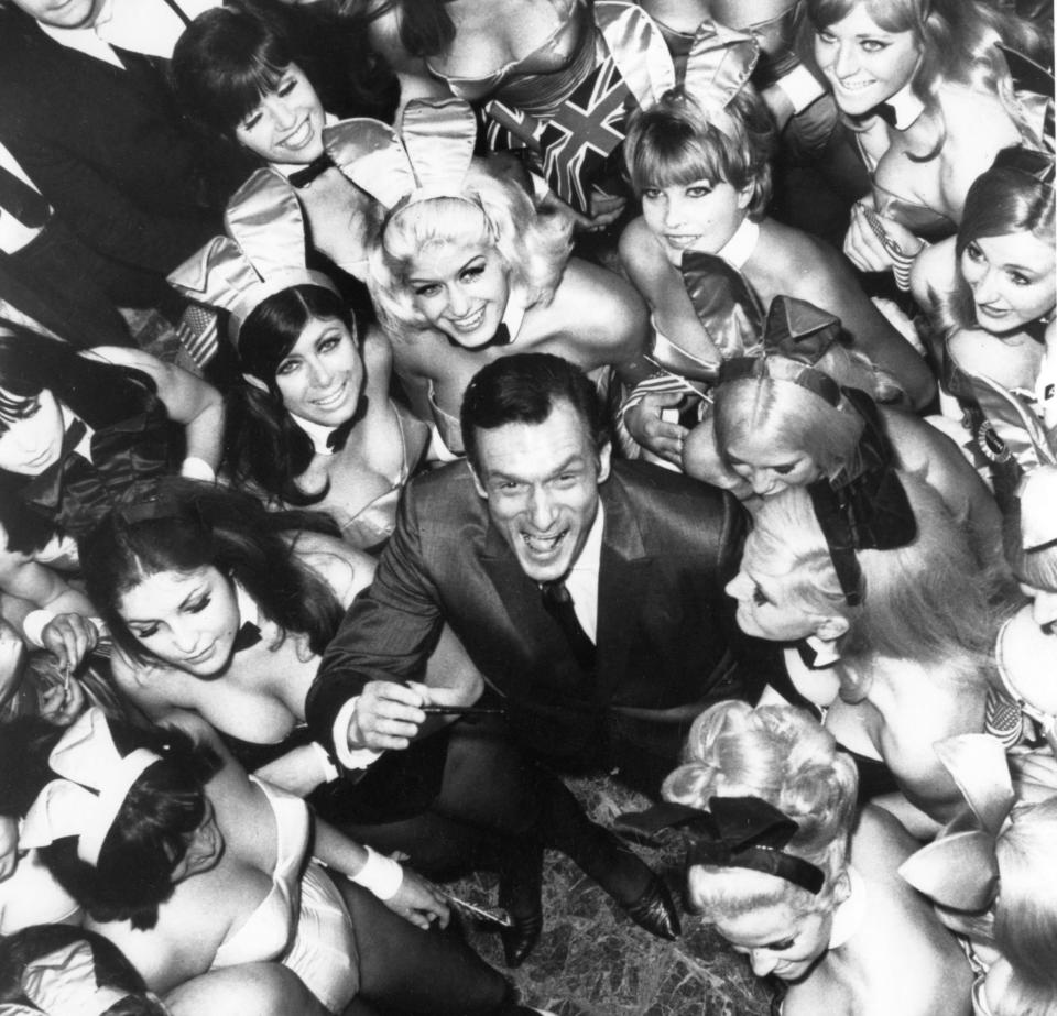 Hugh Hefner surrounded by 50 of his Playboy Bunnies on June 27, 1966, in London. (Photo: Keystone-France/Gamma-Keystone via Getty Images)