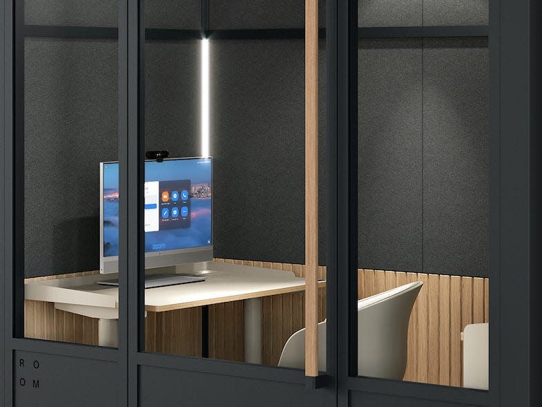 renderings of black Room for Zoom booths in an empty office