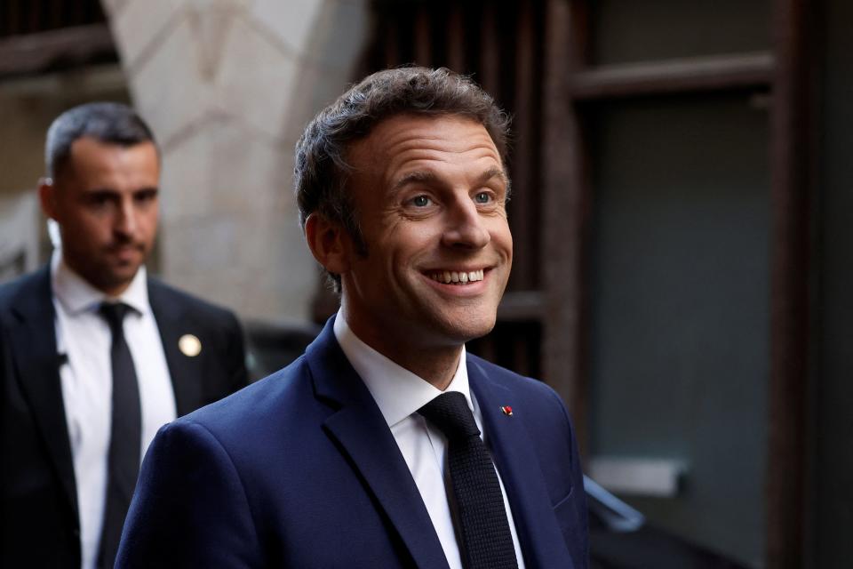 Emmanuel Macron arrives for a campaign rally in Figeac (EPA)