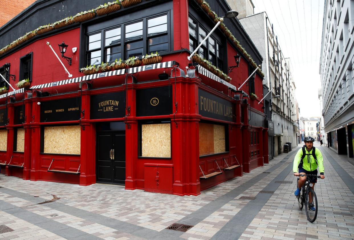 A closed and boarded up pub is seen in Belfast following the outbreak of the coronavirus disease: REUTERS