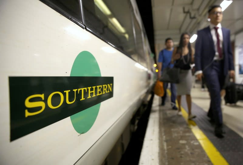 Passengers disembark a Southern train at Victoria Station in London, Britain August 8, 2016. REUTERS/Neil Hall