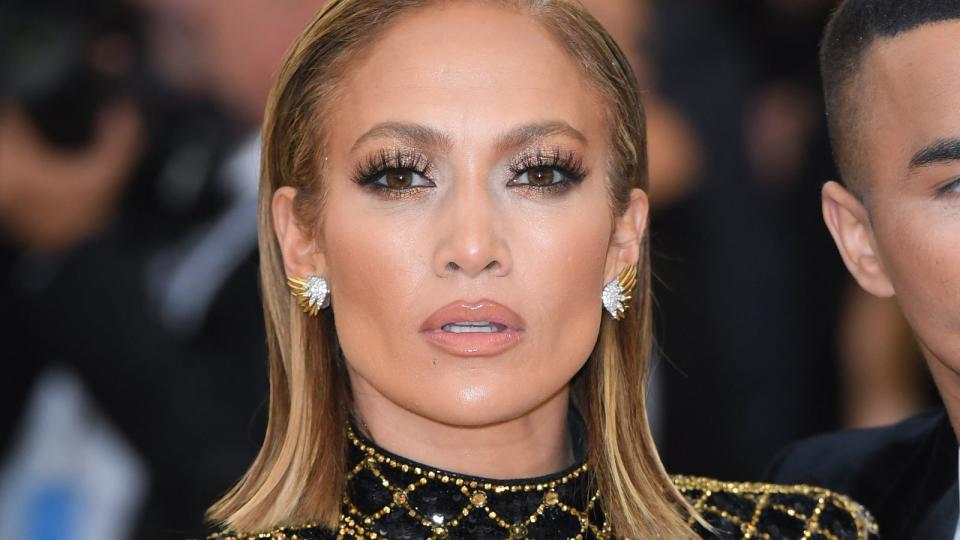 <p> Her bejewelled gown might have been saying international superstar at the 2018 Met Gala, but Jennifer Lopez’s simple hair was very much Jenny from the Block. Her wet look, and tucked-behind-the-ears bob gave the Catholic Imagination dress code a modern feel. </p>