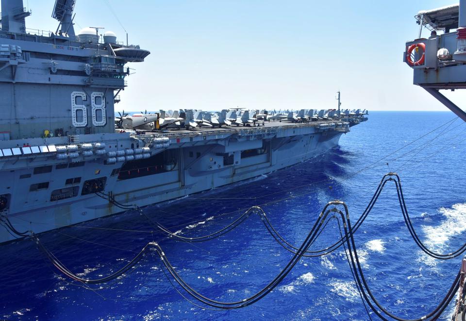 Image: The U.S. Navy aircraft carrier USS Nimitz receives fuel during operations in the South China Sea in July. (US NAVY / Reuters)