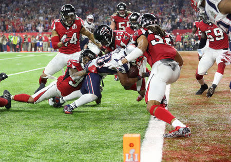 New England Patriots' James White scores a touchdown during overtime to win Super Bowl LI against the Atlanta Falcons. REUTERS/Adrees Latif