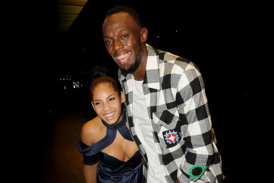 Usain Bolt with Kasi Bennett (Rex Features)