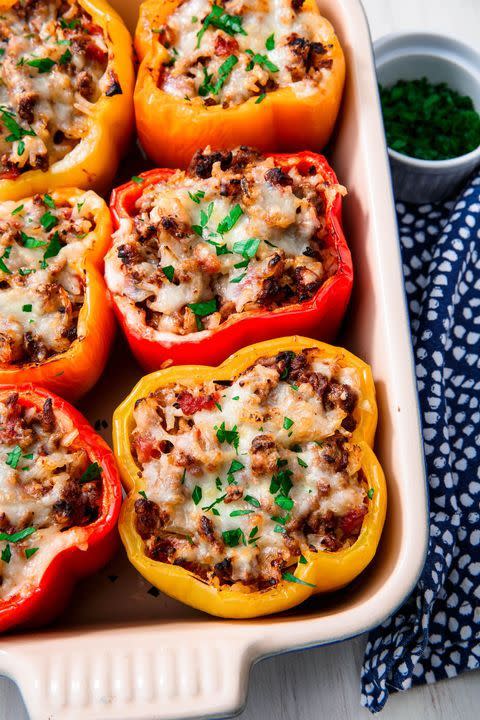 <p>Of all the food you can stuff, <a href="https://www.delish.com/cooking/g4011/stuffed-pepper-recipes/" rel="nofollow noopener" target="_blank" data-ylk="slk:stuffed peppers;elm:context_link;itc:0;sec:content-canvas" class="link ">stuffed peppers</a> are at the top of our list. <a href="https://www.delish.com/cooking/recipe-ideas/g40327395/bell-pepper-recipes/" rel="nofollow noopener" target="_blank" data-ylk="slk:Bell peppers;elm:context_link;itc:0;sec:content-canvas" class="link ">Bell peppers</a> are large enough to hold a lot, strong enough to keep their shape in the oven, and mild enough in flavor to go with just about anything. Here we’re filling them with beefy, tomato rice (use <a href="https://www.delish.com/cooking/recipe-ideas/a25564976/how-to-make-cauliflower-rice/" rel="nofollow noopener" target="_blank" data-ylk="slk:cauliflower;elm:context_link;itc:0;sec:content-canvas" class="link ">cauliflower</a> if you want!), and shredded Monterey Jack cheese, but you can customize them to fit your taste.</p><p>Get the <a href="https://www.delish.com/cooking/recipe-ideas/a23014857/classic-stuffed-peppers-recipe/" rel="nofollow noopener" target="_blank" data-ylk="slk:Classic Stuffed Peppers recipe;elm:context_link;itc:0;sec:content-canvas" class="link "><strong>Classic Stuffed Peppers recipe</strong></a>.</p>