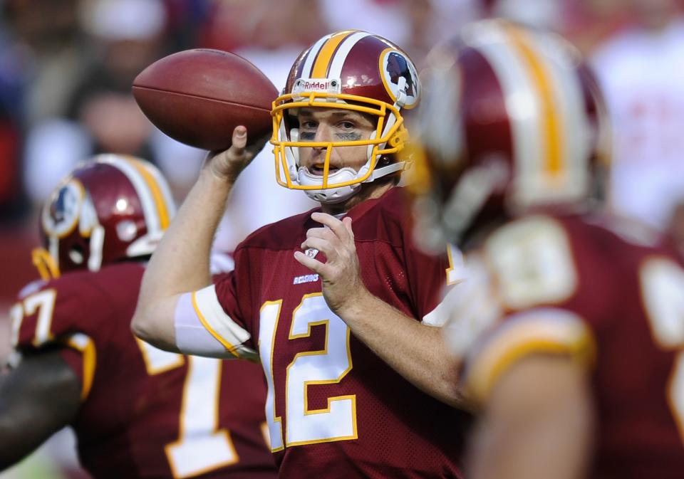 Washington Redskins quarterback John Beck throws to a receiver during game against the <a class="link " href="https://sports.yahoo.com/nfl/teams/san-francisco/" data-i13n="sec:content-canvas;subsec:anchor_text;elm:context_link" data-ylk="slk:San Francisco 49ers;sec:content-canvas;subsec:anchor_text;elm:context_link;itc:0">San Francisco 49ers</a> in Landover, Md on In this Nov. 6, 2011. The former BYU standout still believes in Zach Wilson as an NFL quarterback. | Nick Wass, Associated Press