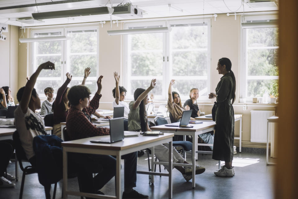 A teacher is asking her class a question