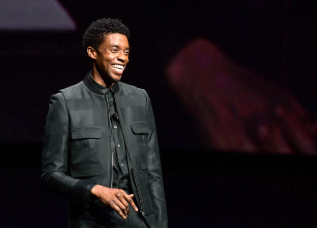 Here are the best Chadwick Boseman movies ranked and a look back on the legacy the actor left before passing. Pictured: Chadwick Boseman smiling on stage at CinemaCon in 2019. | 