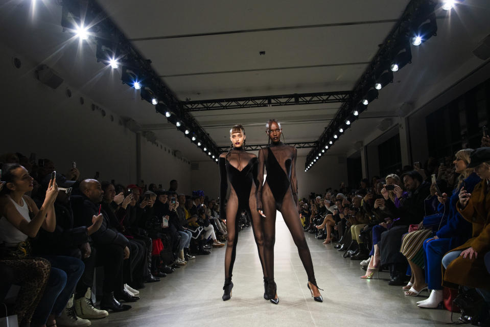 The LaQuan Smith collection is modeled during Fashion Week, Saturday, Feb. 8, 2020, in New York. (AP Photo/Eduardo Munoz Alvarez)