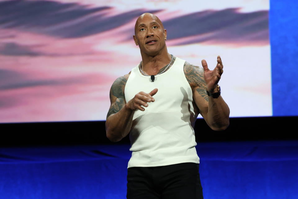 LAS VEGAS, NEVADA - APRIL 11: Dwayne Johnson speaks onstage during the Walt Disney Studios presentation at Cinemacon in Las Vegas, Nevada on April 11, 2024. (Photo by Jesse Grant/Getty Images for Disney)