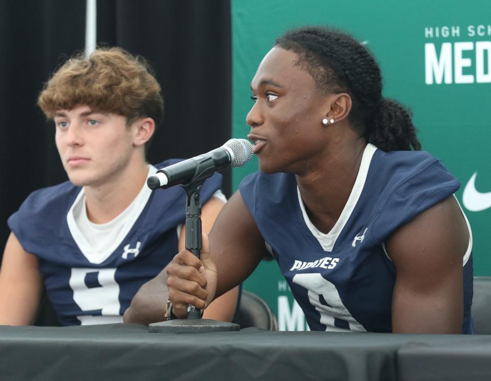 East Rutherford, NJ August 8, 2023 -- Liam Londergan and Jaylen McClain of Seton Hall Prep at the high school football Super Football Conference Media Day at MetLife Stadium.