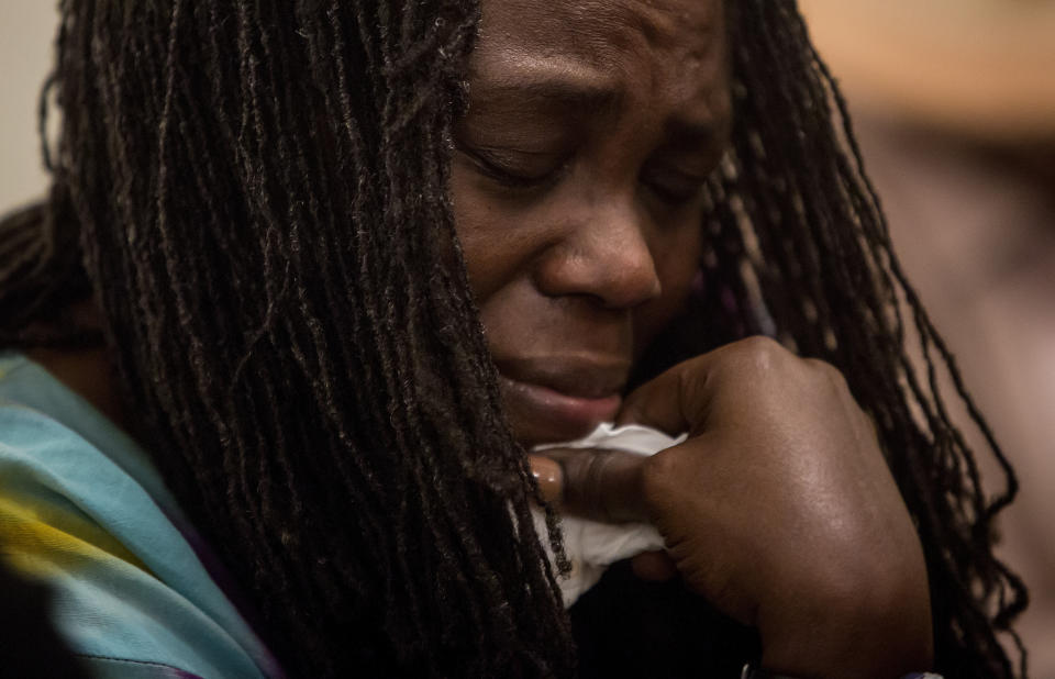 NEW YORK, NY - JUNE 18:  A woman cries at a prayer vigil for the nine victims of last night's shooting at the historic Emanuel African Methodist Episcopal Church in Charleston, South Carolina June 18, 2015 at the First African Methodist Episcopal Church: Bethel in the Harlem neighborhood of New York City.  Dylann Storm Roof, 21, of Lexington, South Carolina, who allegedly attended a prayer meeting at the church for an hour before opening fire and killing three men and six women, was arrested today. Among the dead is the Rev. Clementa Pinckney, a state senator and a pastor at Emanuel AME, the oldest black congregation in America south of Baltimore, according to the National Park Service.   (Photo by Eric Thayer/Getty Images)