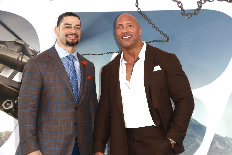 Roman Reigns junto a su primo The Rock en la premiere de Hobbs & Shaw, película donde Reigns interpretó a Mateo Hobbs. (Tommaso Boddi/WireImage)