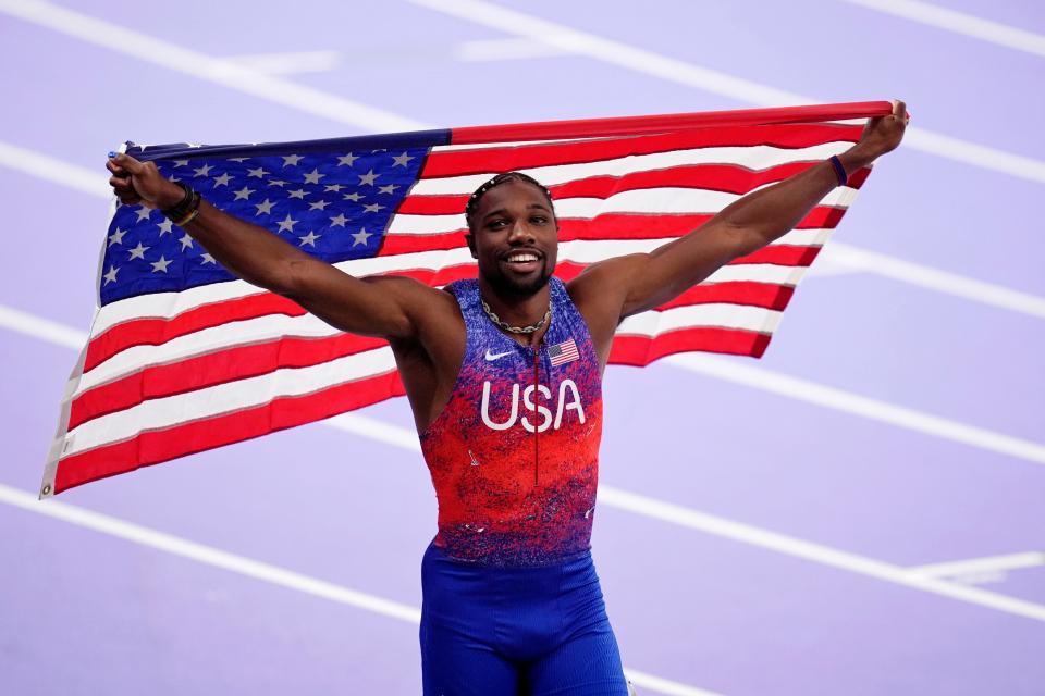 Aug 4, 2024; Paris Saint-Denis, France; Noah Lyles (USA) celebrates after winning the men’s 100m final during the Paris 2024 Olympic Summer Games at Stade de France. Mandatory Credit: Andrew Nelles-USA TODAY Sports