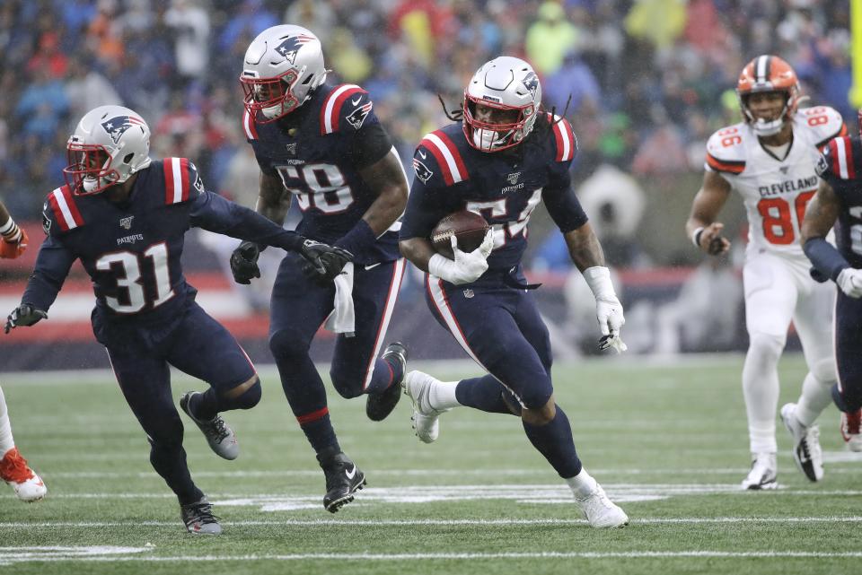 New England Patriots linebacker Dont'a Hightower (54) runs for a touchdown after recovering a fumble in the first half of an NFL football game against the Cleveland Browns, Sunday, Oct. 27, 2019, in Foxborough, Mass. (AP Photo/Elise Amendola)