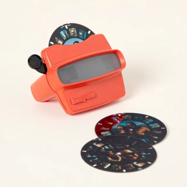 red view finder in front of photo reels