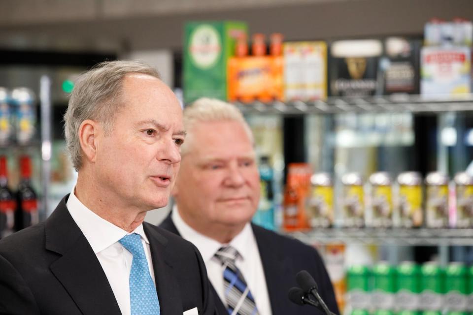 Ontario Premier Doug Ford and Finance Minister Peter Bethlenfalvy are pictured during a news conference announcing the provincial government's plan to allow the sale of alcohol in convenience stores, at a Circle K convenience store in Toronto on Dec. 14, 2023.