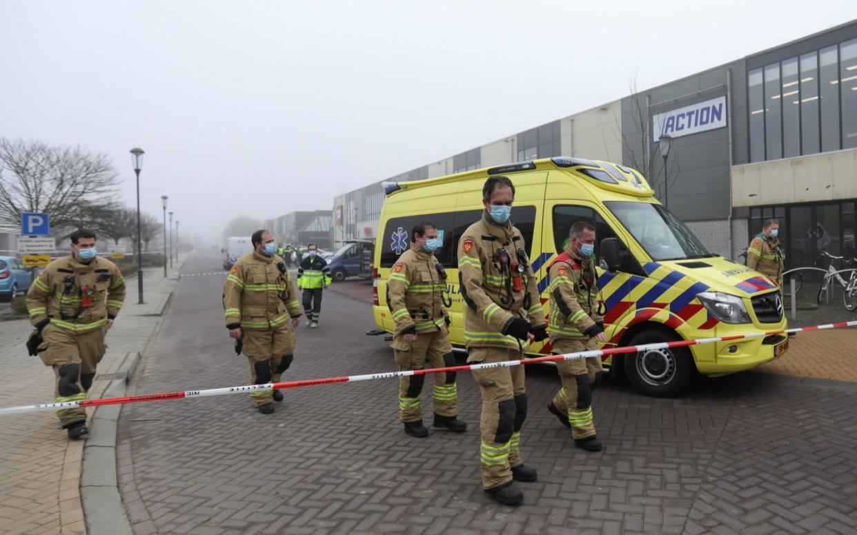 Emergency responders secure the area at the scene of an explosion at a coronavirus testing location in Bovenkarspel - EVA PLEVIER /REUTERS