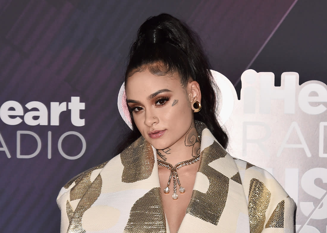 The higher the pony, the fiercer the gaze. Kehlani sports a super-sleek high ponytail at the 2018 iHeartRadio Music Awards. (Photo: Getty Images)