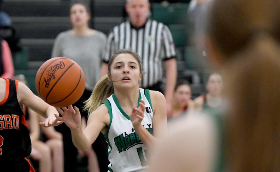 West Branch's Chloe Dennison makes a pass in the first half against Chagrin Falls in OHSAA Division II District Semifinals at Nordonia High School. Wednesday, February 28, 2024.