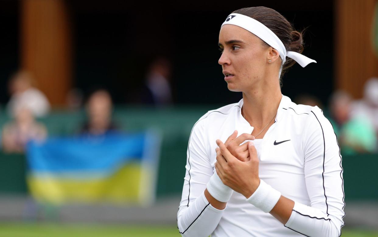 Anhelina Kalinina from the Ukraine in action against Anna Bondar on day one of the 2022 Wimbledon Championships at the All England Lawn Tennis and Croquet Club, Wimbledon. - PA